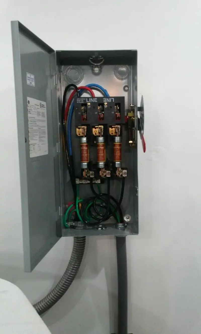 Three-phase disconnect switch installed for Smoke Detector Installation in Wood River