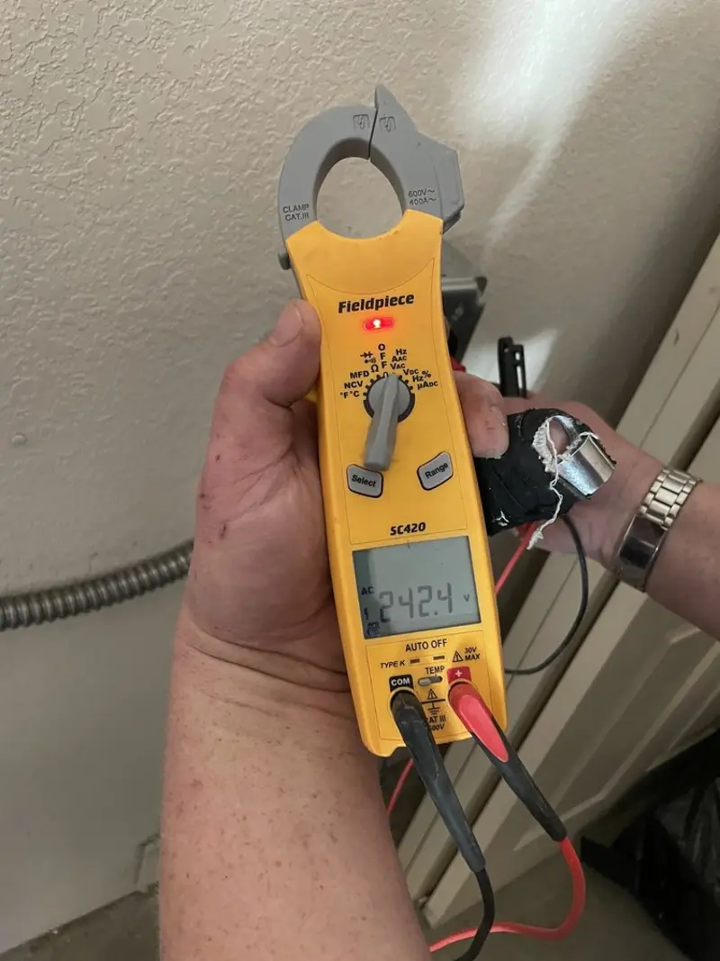 Voltage testing with clamp meter during Hot Tub / Pool Electrical Wiring in Wood River